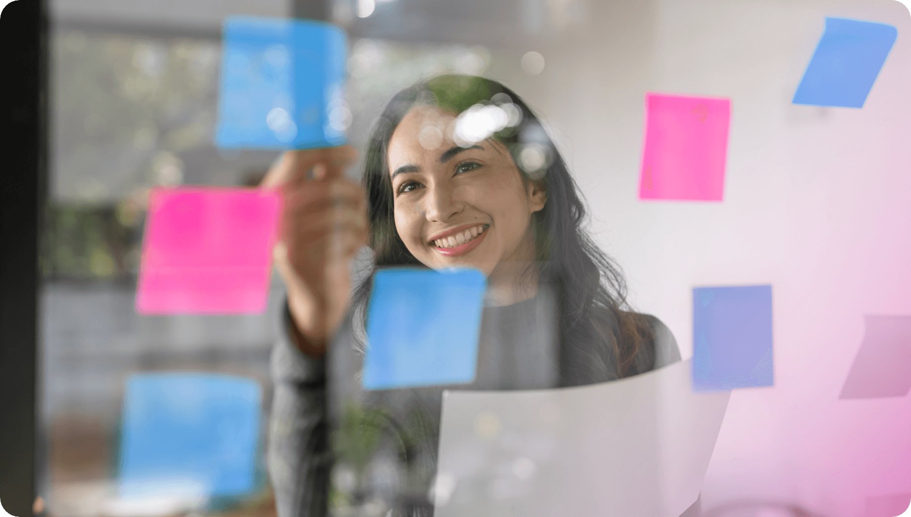 Background showing person with colorful sticky notes